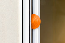 Load image into Gallery viewer, Blockystar Ovni DoorStop WindowStop Orange

